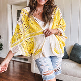 Short 3/4 sleeve yellow and cream crochet batwing cardigan.