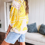 Short 3/4 sleeve yellow and cream crochet batwing cardigan.
