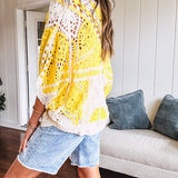 Short 3/4 sleeve yellow and cream crochet batwing cardigan.