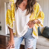 Ribbed textured spaghetti strap V neck with lace detail tank.