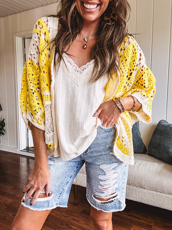 Ribbed textured spaghetti strap V neck with lace detail tank.