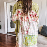 Olive washed duster length button up shirt with collar, long sleeves and multi colored paste floral patchwork and lace detail throughout.