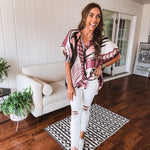 Mauve, black and white abstract print chiffon button down top with 3/4 sleeves.