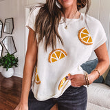 Lightweight cream woven sweater with short, capped sleeves and knitted lemon appliques on the front.