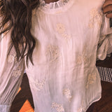Ivory Chic Embroidered Blouse with Flutter Neckline