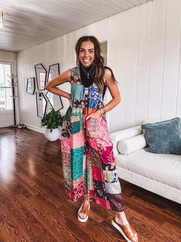 Soft ribbed textured turtleneck tank sweater.