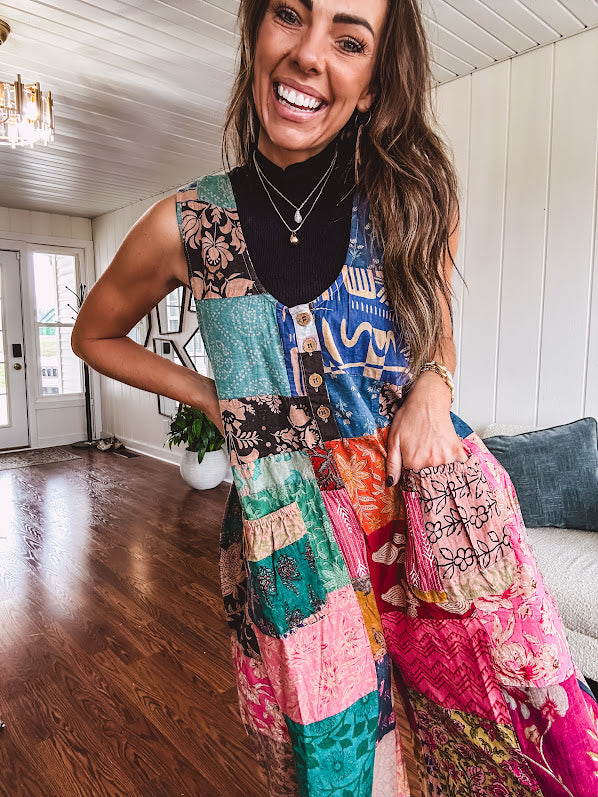 Soft ribbed textured turtleneck tank sweater.