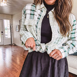 Thin, lightweight black wide leg pants with elastic waist and textured fabric.