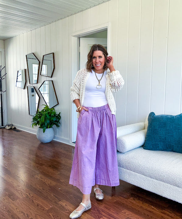Open weave, window pane crochet cropped long sleeve open front cardigan.
