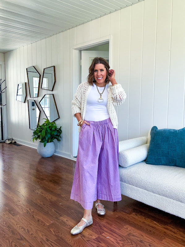 Open weave, window pane crochet cropped long sleeve open front cardigan.