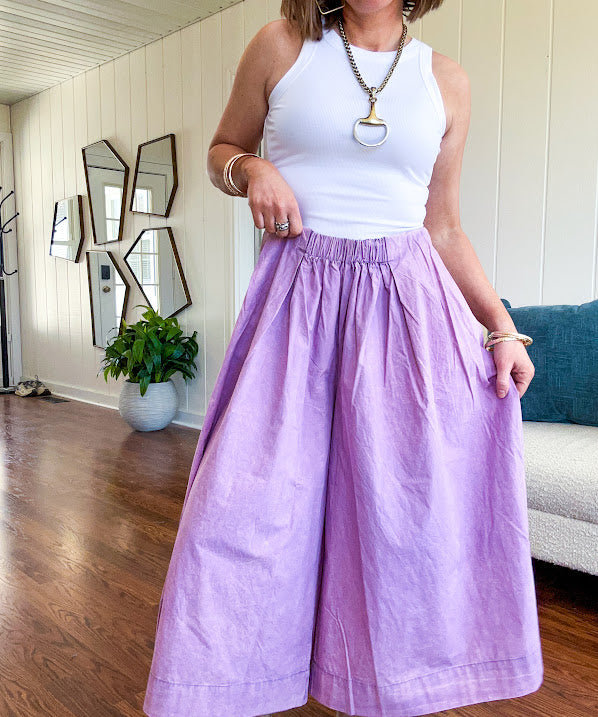Thin, lightweight washed lavender cotton ultra wide leg pants with pleated front elastic waist.