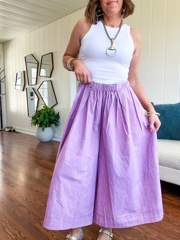 Thin, lightweight washed lavender cotton ultra wide leg pants with pleated front elastic waist.