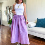 Thin, lightweight washed lavender cotton ultra wide leg pants with pleated front elastic waist.