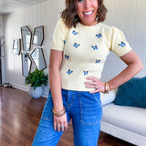 Stretchy medium wash utility style cropped denim with a high rise.