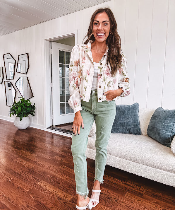 Cream short jacket with puff sleeves, oversized buttons down the front with vintage pink and green florals throughout.