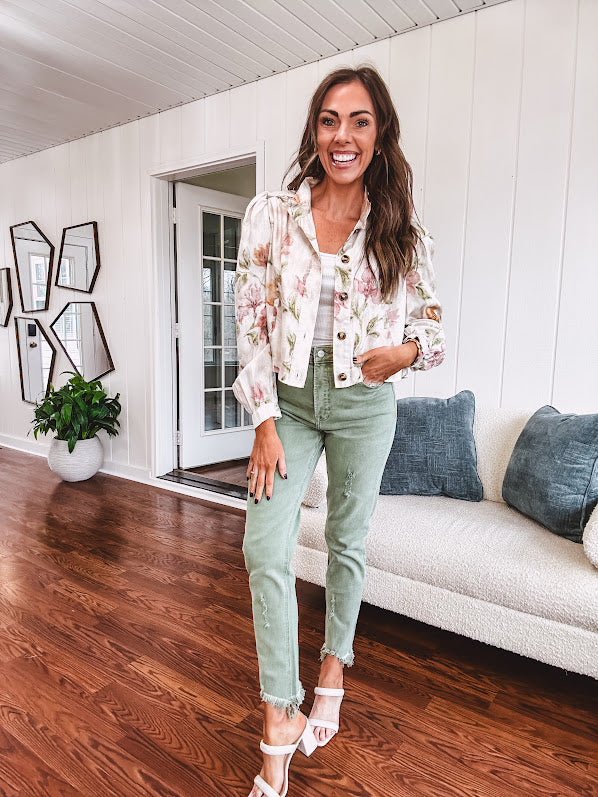 Cream short jacket with puff sleeves, oversized buttons down the front with vintage pink and green florals throughout.