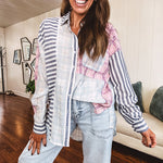 Light wash barrel jeans with extra large pockets and flared, raw hems.