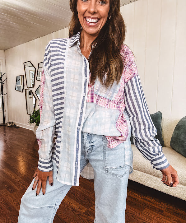 Light wash barrel jeans with extra large pockets and flared, raw hems.