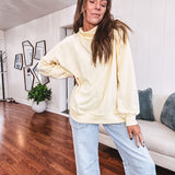Thin, lightweight soft long sleeved pullover with mock neck and exposed seams, oversized.
