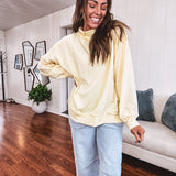 Thin, lightweight soft long sleeved pullover with mock neck and exposed seams, oversized.