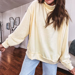 Thin, lightweight soft long sleeved pullover with mock neck and exposed seams, oversized.