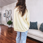 Thin, lightweight soft long sleeved pullover with mock neck and exposed seams, oversized.