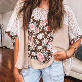 Lightweight ribbed textured taupe top with lace at the yoke and sides and a brown and pink and blue floral patch in the front at at the cuffs of the short sleeves. Oversized.