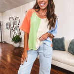 Gauze colorblock V neck tee with light blue, cream, sage and coral stripes.