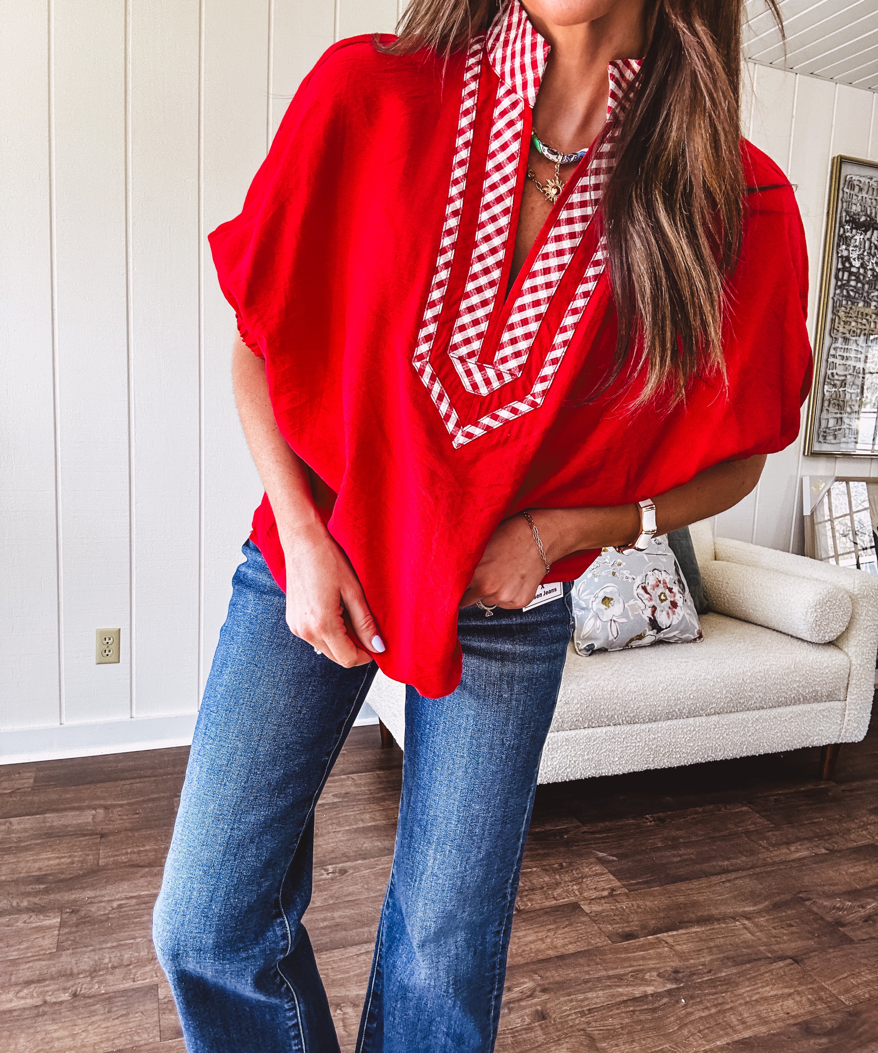 Cool red dolman style top with white and red gingham trim at the mock neck and yoke.