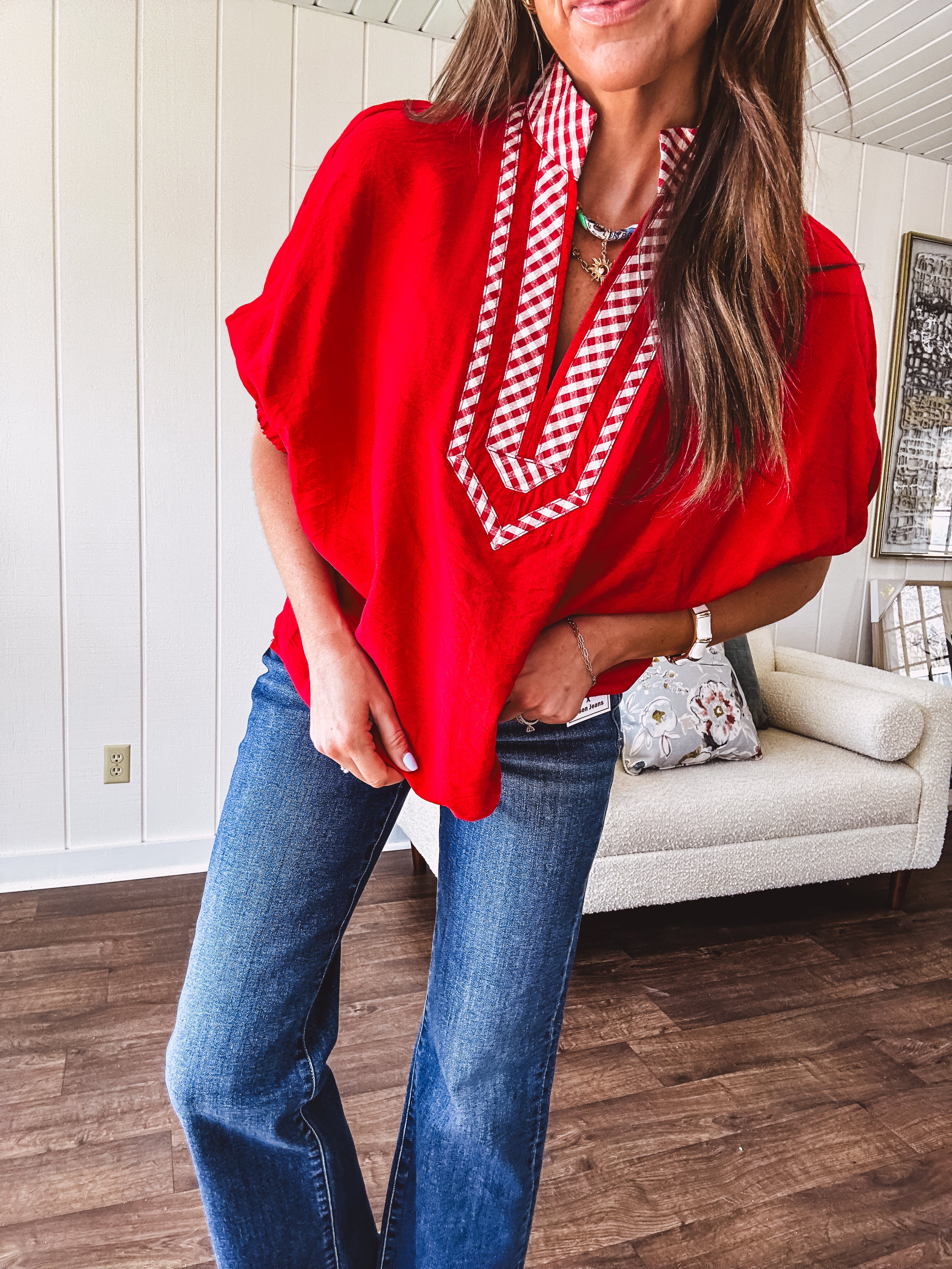 Cool red dolman style top with white and red gingham trim at the mock neck and yoke.