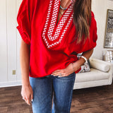 Cool red dolman style top with white and red gingham trim at the mock neck and yoke.