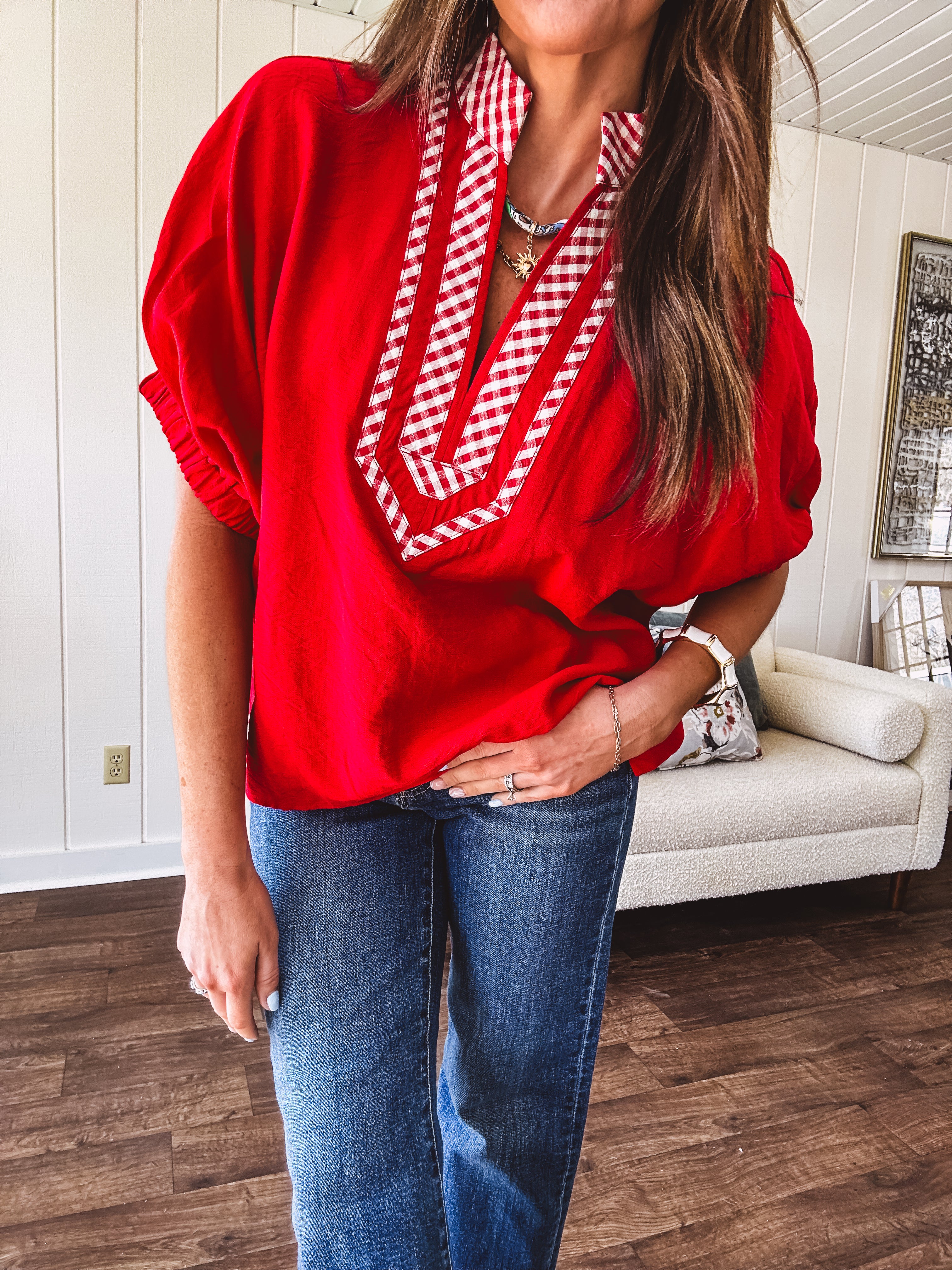 Cool red dolman style top with white and red gingham trim at the mock neck and yoke.
