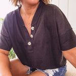 Lightweight waffle texture V neck tee with three buttons at neck.
