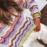 Lightweight cropped crochet long sleeved round neck pullover in pink, white, sage, orange and purple wave design.