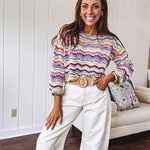 Ecru cropped wide leg pants with barrel stitching on the inner knees, contrast stitching and zero stretch.
