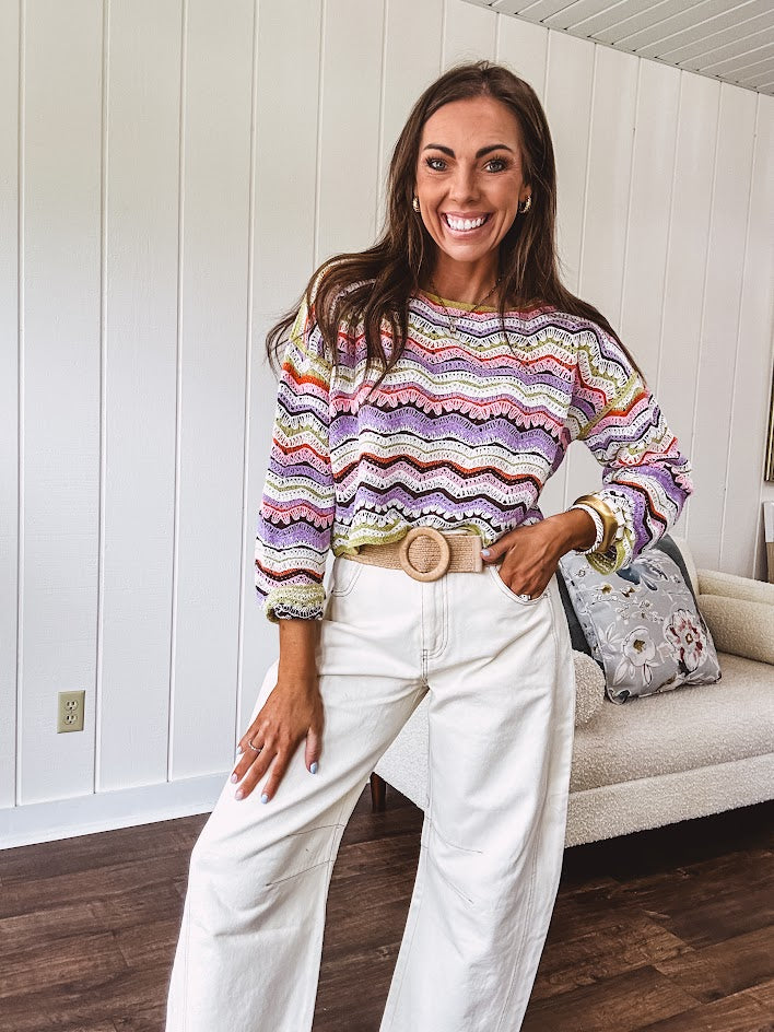 Ecru cropped wide leg pants with barrel stitching on the inner knees, contrast stitching and zero stretch.