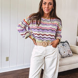 Lightweight cropped crochet long sleeved round neck pullover in pink, white, sage, orange and purple wave design.