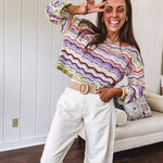 Lightweight cropped crochet long sleeved round neck pullover in pink, white, sage, orange and purple wave design.