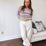 Ecru cropped wide leg pants with barrel stitching on the inner knees, contrast stitching and zero stretch.
