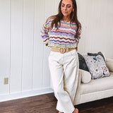 Ecru cropped wide leg pants with barrel stitching on the inner knees, contrast stitching and zero stretch.