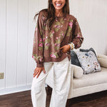 Ecru cropped wide leg pants with barrel stitching on the inner knees, contrast stitching and zero stretch.
