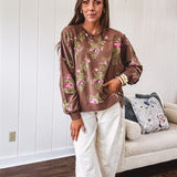 Thin chestnut brown boatneck crew with vintage inspired pink and green floral print and split front hem with exposed seams.