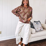Ecru cropped wide leg pants with barrel stitching on the inner knees, contrast stitching and zero stretch.