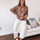 Ecru cropped wide leg pants with barrel stitching on the inner knees, contrast stitching and zero stretch.