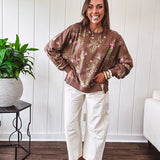 Ecru cropped wide leg pants with barrel stitching on the inner knees, contrast stitching and zero stretch.