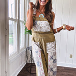 Light olive green washed cotton overalls with pastel floral patchwork throughout including on the adjustable traps with metal clasps and zippered sides.