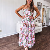 Pink strapless midi dress with floral and berry motif in red, blue and white with pleated front bodice and back smocked bodice, fully lined pleated skirt, with pockets.