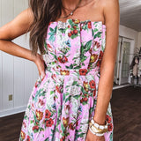 Pink strapless midi dress with floral and berry motif in red, blue and white with pleated front bodice and back smocked bodice, fully lined pleated skirt, with pockets.
