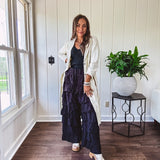 Black ruffled tiered pants, fully lined with elastic waist band.