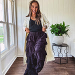Black ruffled tiered pants, fully lined with elastic waist band.